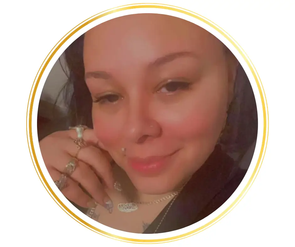 african american woman with gold rings closeup headshot