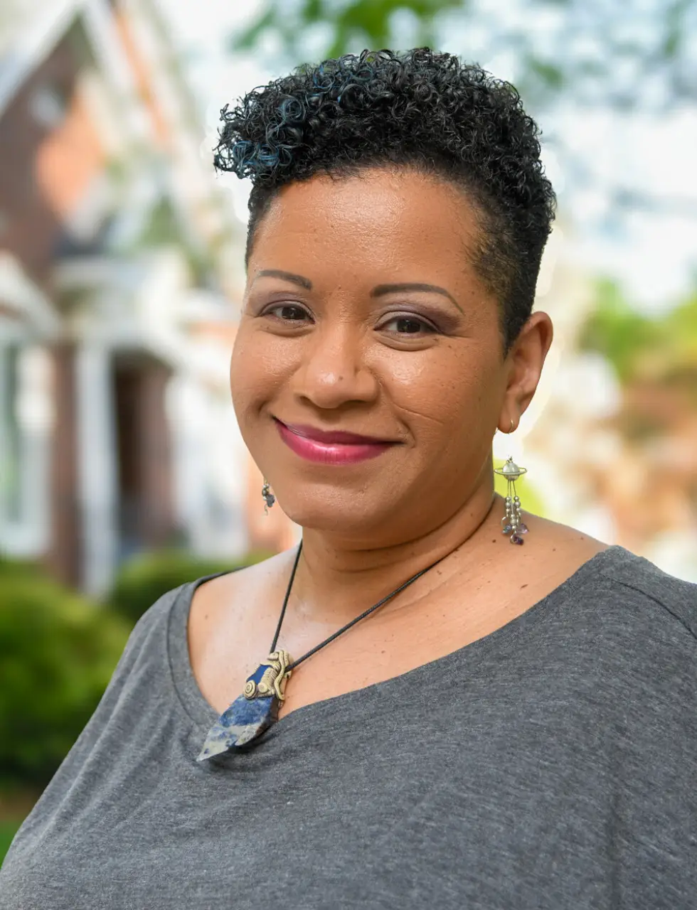Mel Morris african american woman with short curly hair headshot