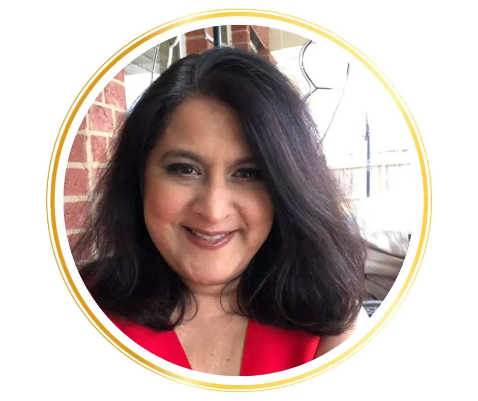 asian american woman with dark hair smiling headshot
